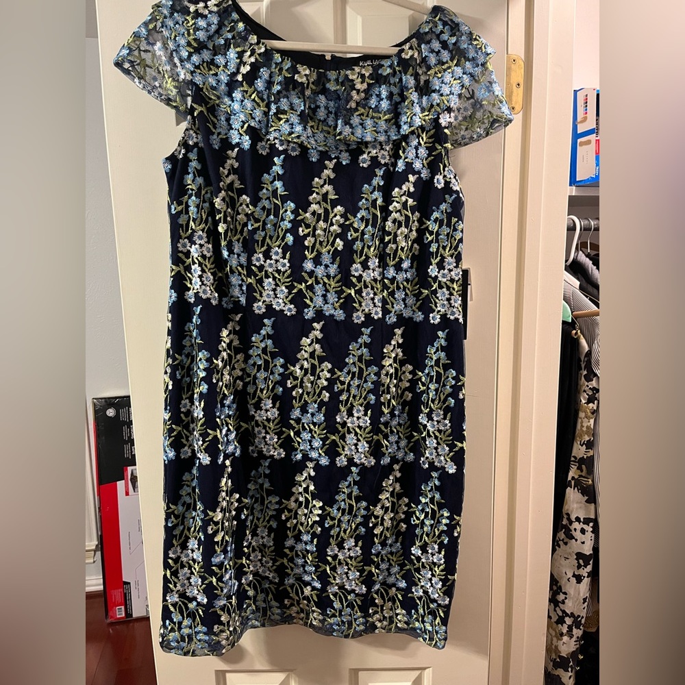 Navy dress with embroidered blue white and green flowers